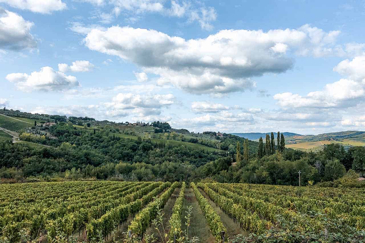 Exploring the scenic Tuscan countryside on a vespa