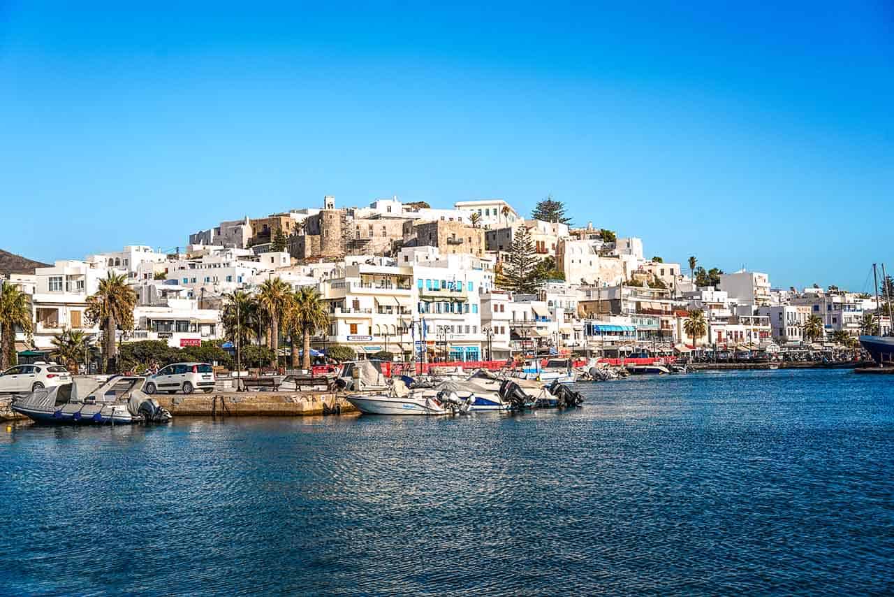 Seafront of Naxos Town with boats, hotels, cafes and tavernas