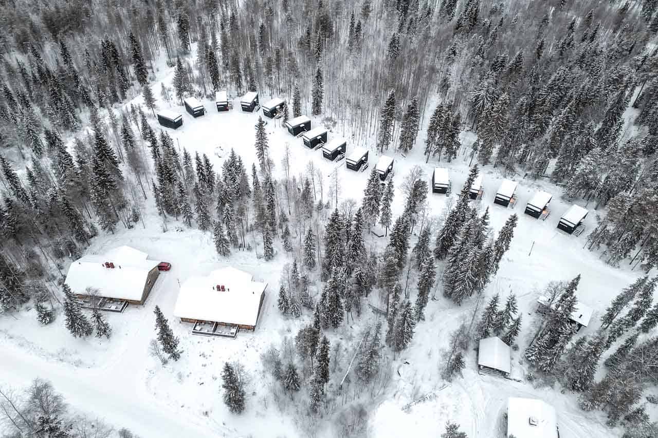 What to wear in Lapland Packing List: A snowy winter landscape