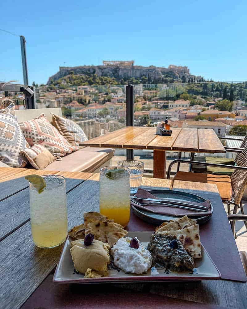 Hotel rooftop terrace overlooking the Acropolis in Athens